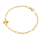 Gold-toned paperclip chain bracelet with a four-leaf clover charm and a lobster clasp closure.