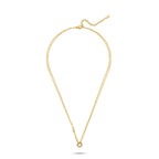 Gold-toned duochain necklace with a small clear crystal on one chain and a crystal-encrusted open circle pendant.