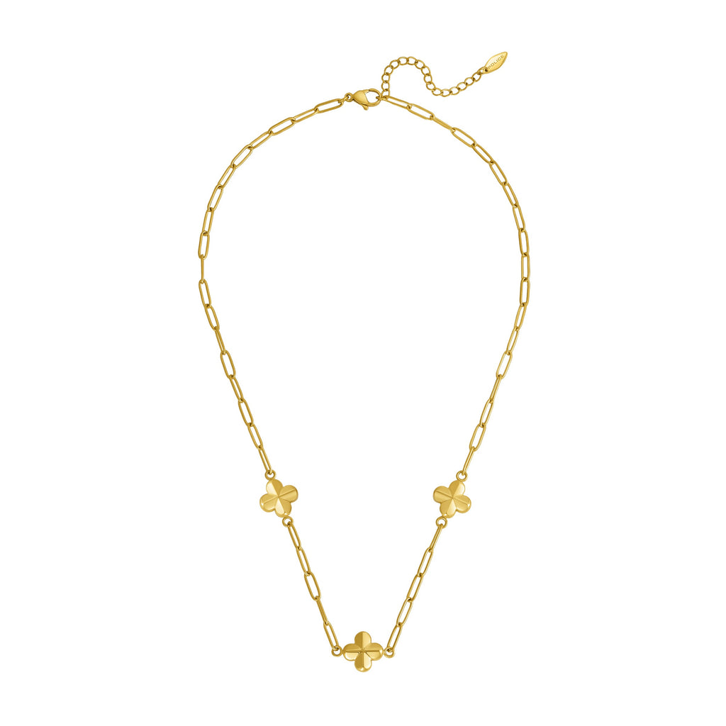 Gold-toned paperclip chain necklace with three clover charms, a lobster clasp, and an extender chain.