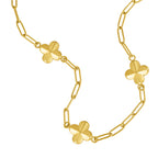 Gold-toned paperclip chain necklace with three polished clover-like charms spaced along its length.