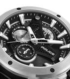 Silver-toned case, black textured dial, white rectangular markers, silver-toned hands, three sub-dials, 'POLICE' logo. Black