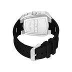 Back of a watch with a silver-toned rectangular stainless steel case, sunburst pattern, and a black silicon strap with a silv