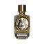 Parfum De Mahzen Gugalanna Extrait De Parfum 100ml bottle with olive green liquid, gold-toned cap, and ornate black and cream
