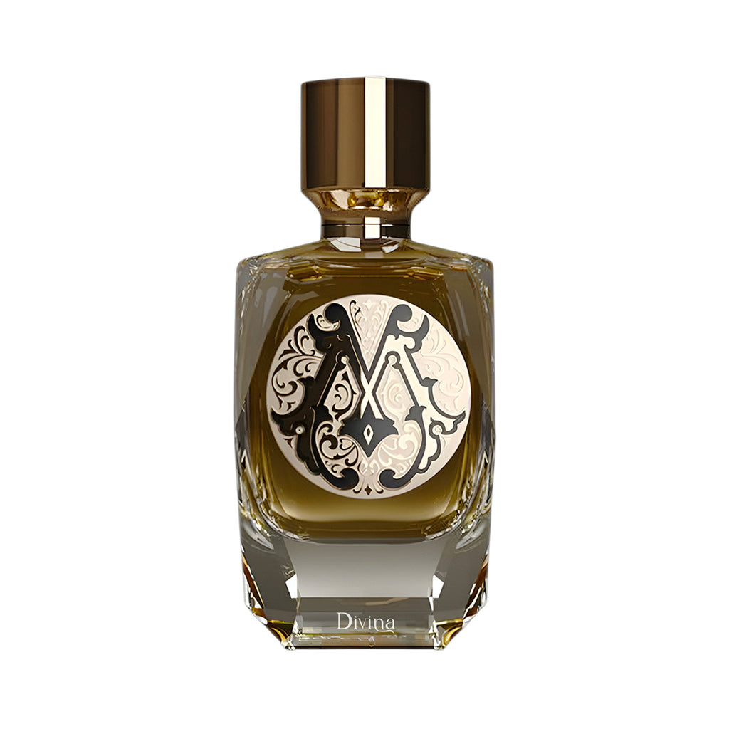 Clear glass perfume bottle with amber liquid, gold-toned cap, ornate black and white 'MA' monogram label. 'Divina' embossed o