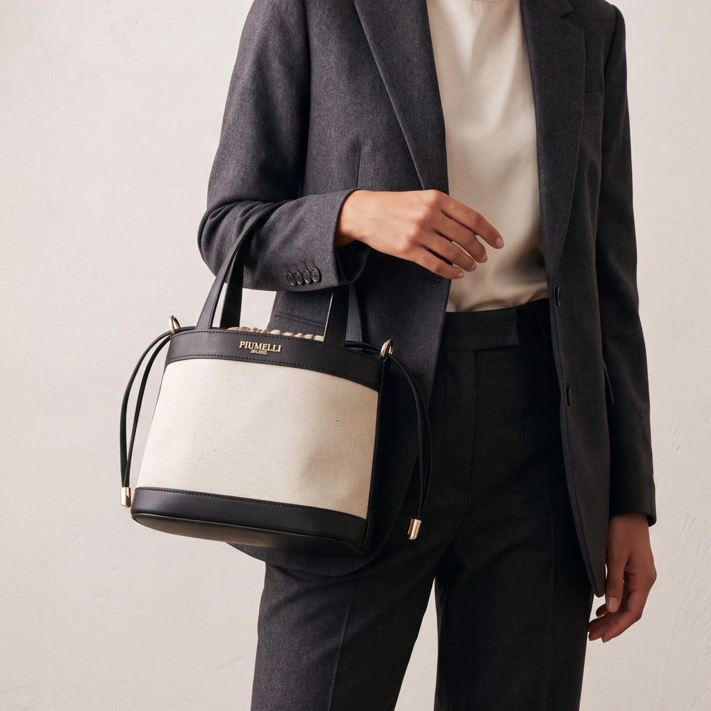 PIUMELLI Noya Canvas and Leather Bucket Bag with Drawstring Closure