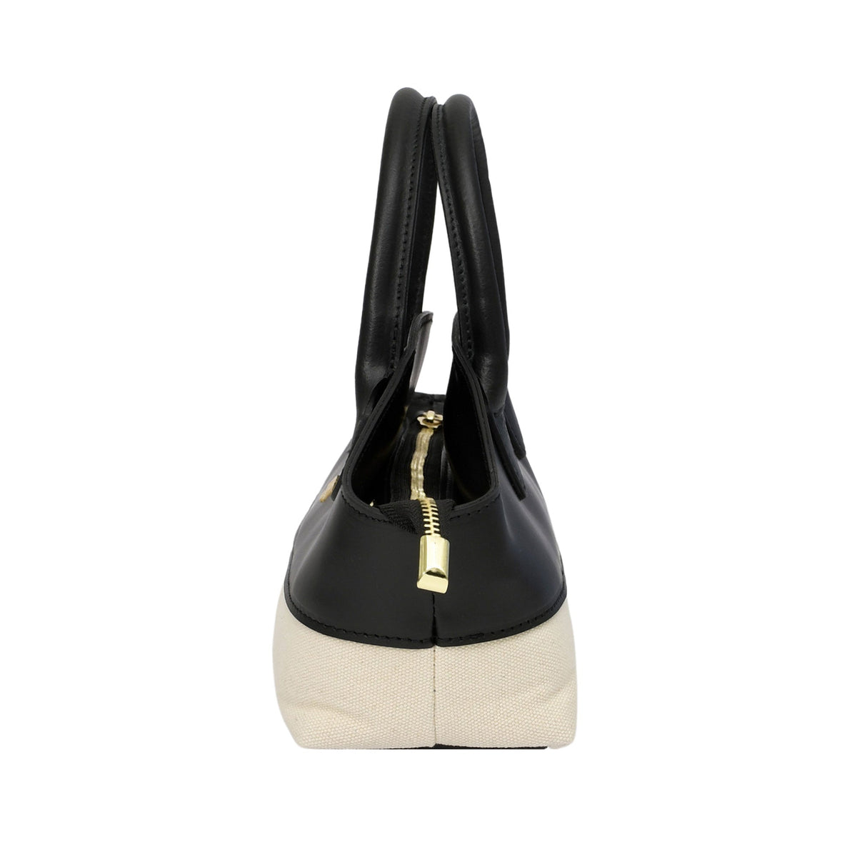 Structured black and off-white handbag with two top handles, a gold-toned top zipper, and a gold-toned zipper pull.