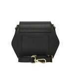 Black pebbled leather hexagonal flap bag with a back slip pocket and an adjustable strap featuring gold-toned hardware.