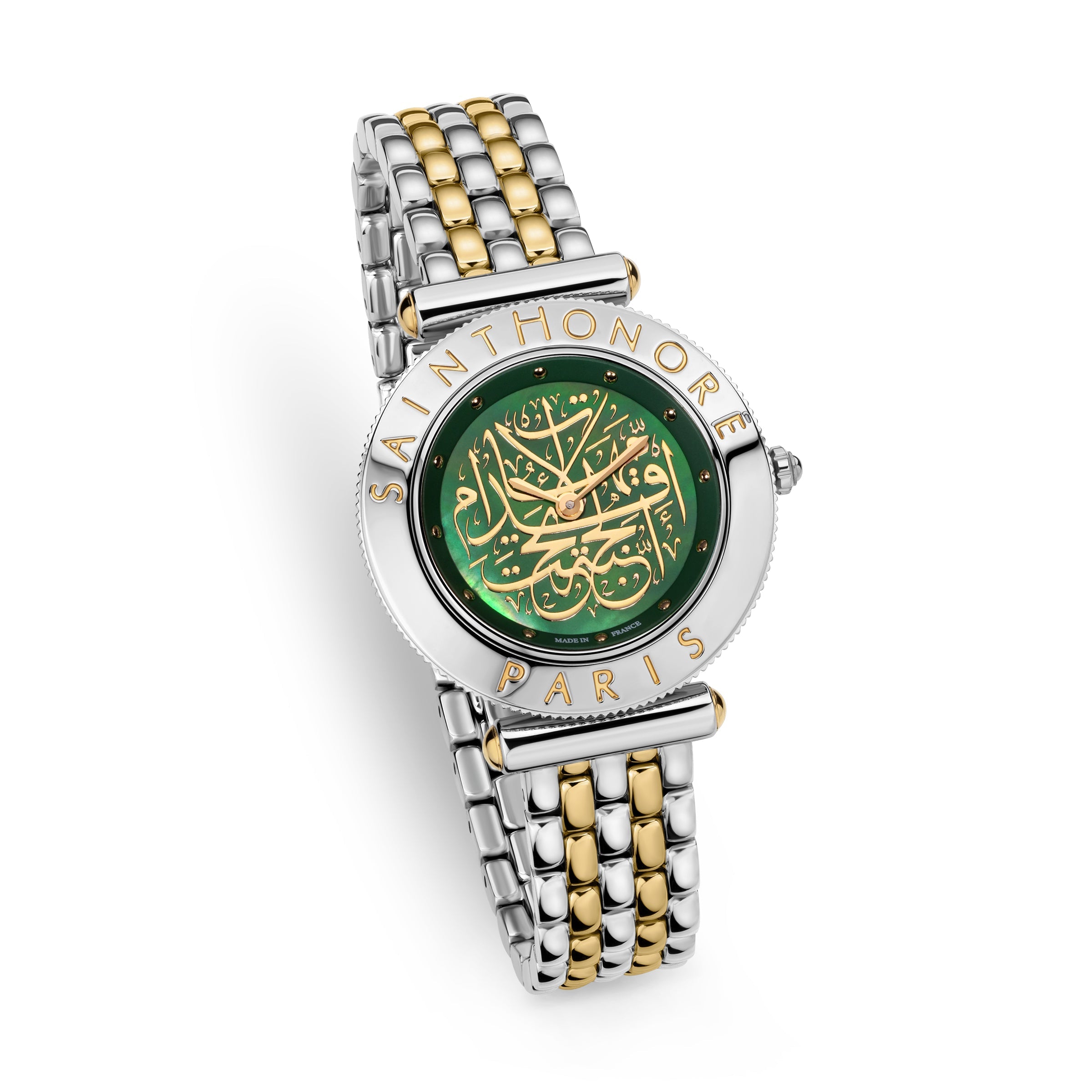 Three-quarter studio perspective highlighting the flat engraved bezel profile, the fluted crown, the iridescence of the green dial, and the flexible drape of the two-tone silver and gold bracelet.
