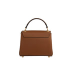 Structured brown leather top handle bag with a flap closure, dark handle, and gold-toned hardware and feet.