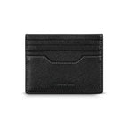 A direct back-facing view of the black leather cardholder, showcasing the uniform cross-grain texture, precision stitching, and a clean debossed brand emblem on the rear surface.