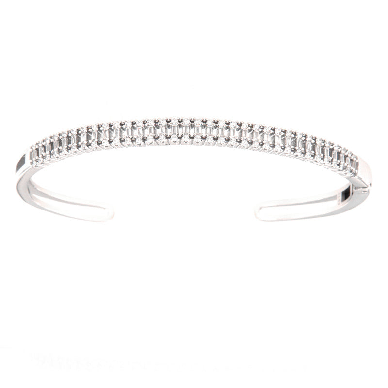 Silver-toned open-cuff bangle adorned with two rows of clear, rectangular-cut simulated stones.