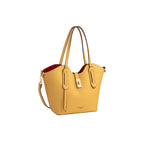 Small pebbled yellow leather tote bag with red lining, two top handles, gold-toned turn-lock, and detachable shoulder strap.