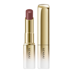 Sensai lipstick with gold casing on a white background.