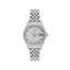 Silver-toned round watch with a patterned dial, crystal hour markers, date window, fluted bezel, and a silver-toned metal lin