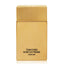 Gold-toned rectangular Tom Ford Noir Extreme Parfum bottle with a ribbed cap and black text.
