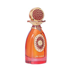 Amber-red perfume bottle with a round gold-toned cap featuring a red mosaic pattern. Gold-toned emblem with red mosaic design