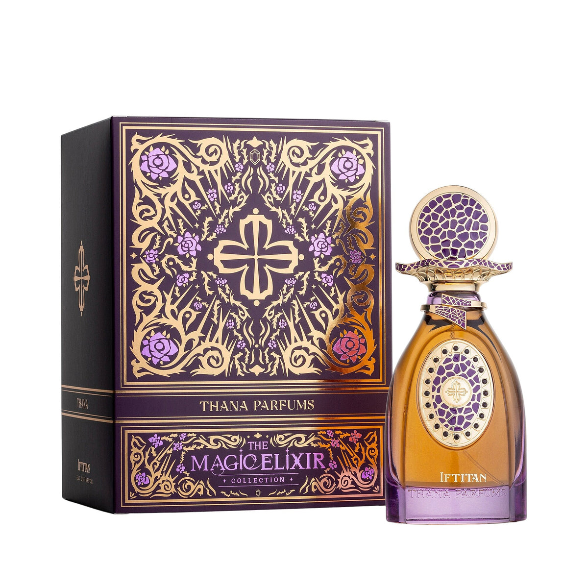 Dark purple box with ornate gold-toned scrollwork, lilac flowers, and a central emblem. Amber bottle with purple base, gold-t