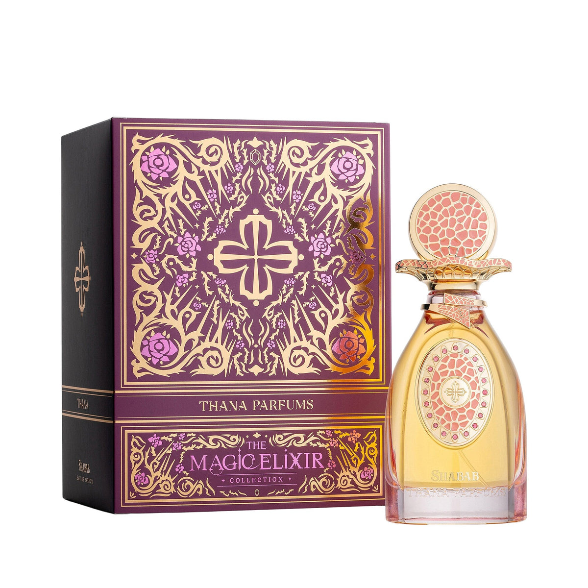 Dark purple box with gold-toned ornate patterns and pink roses. Clear amber perfume bottle with a gold-toned cap and coral-pi