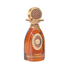 Amber glass perfume bottle with a gold-toned cap and ornate medallion. The cap and medallion have brown textured patterns and