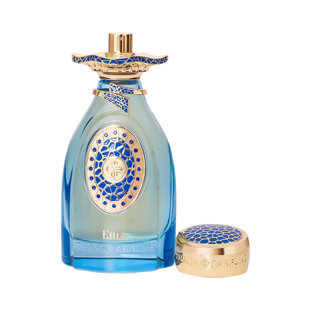 Blue glass perfume bottle with gold-toned accents, blue mosaic patterns, and "EIHA" text. Matching gold-toned cap with blue m