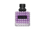A Valentino Donna Born In Roma Stravaganza fragrance bottle in a striking purple hue. The glass features the signature all-over pyramid rockstud texture with a clear-to-purple gradient, topped with a matte black cap and a black leather-style label with purple Valentino branding.