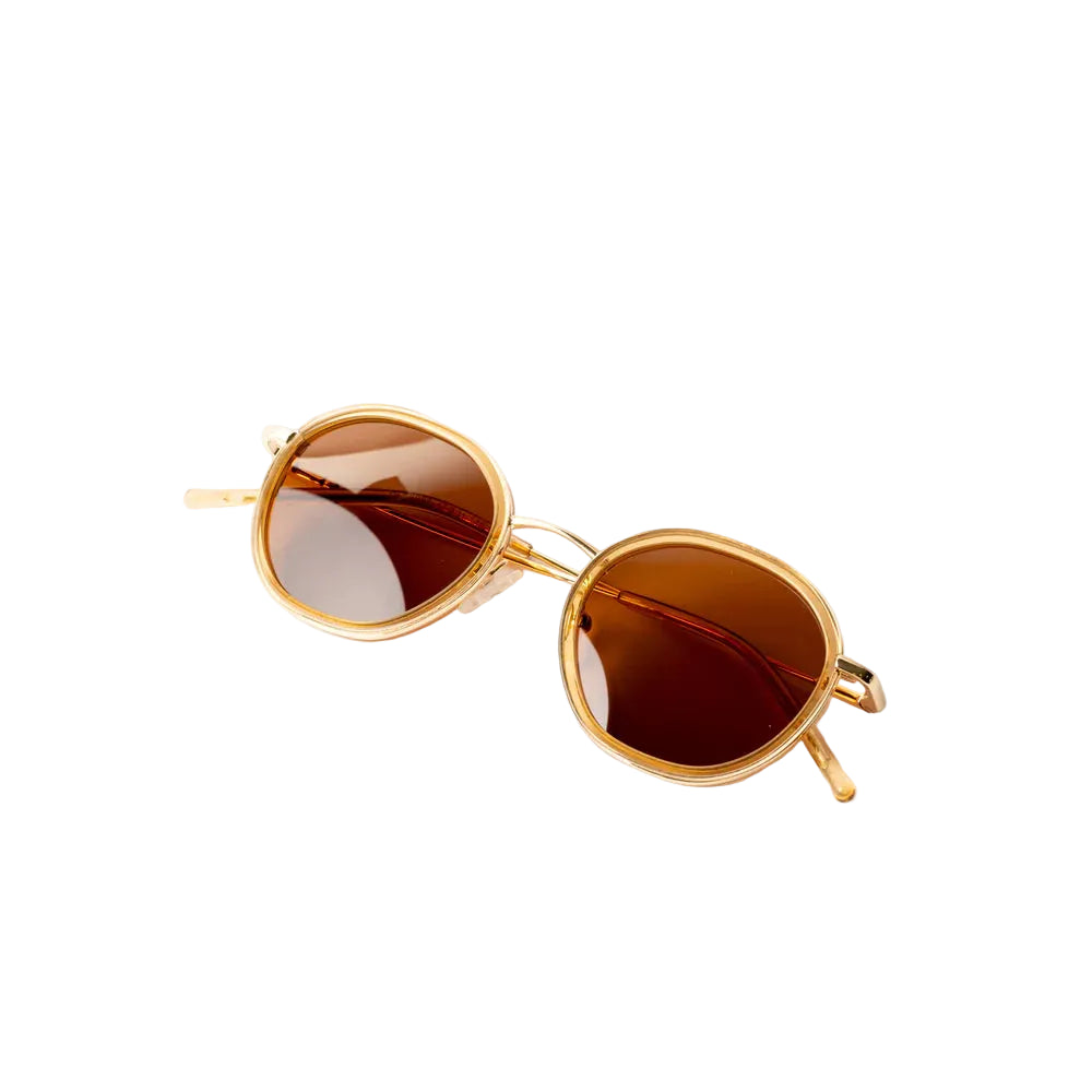 Vayo Aurum sunglasses with gold metal frame and orange tinted lenses