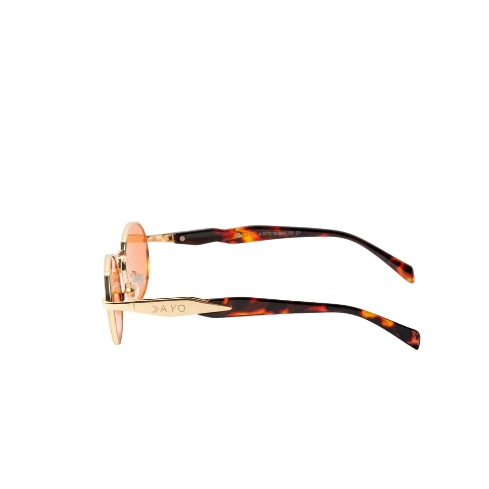 Vayo Ember sunglasses with gold metal frame and orange tinted lenses