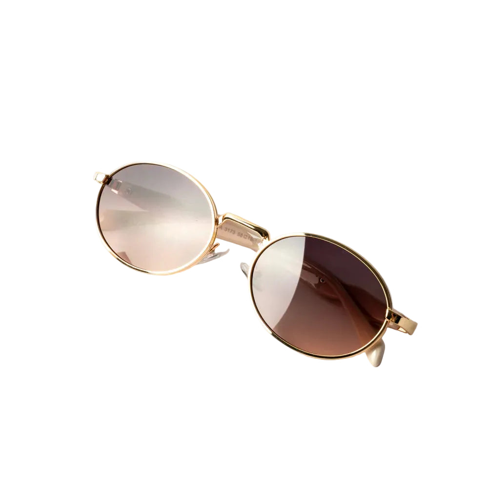 Vayo Glint sunglasses with gold metal frame and brown gradient lenses