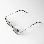 Vayo Solaris Edge metal sunglasses with dark blue lenses and sleek geometric frame