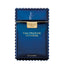 Versace Man Eau Fraîche Extrême perfume bottle in deep blue translucent glass with distinct serrated edges, a matching blue cap, and gold lettering.