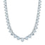 Silver-toned graduated round necklace featuring brilliant clear faceted stones in individual settings.