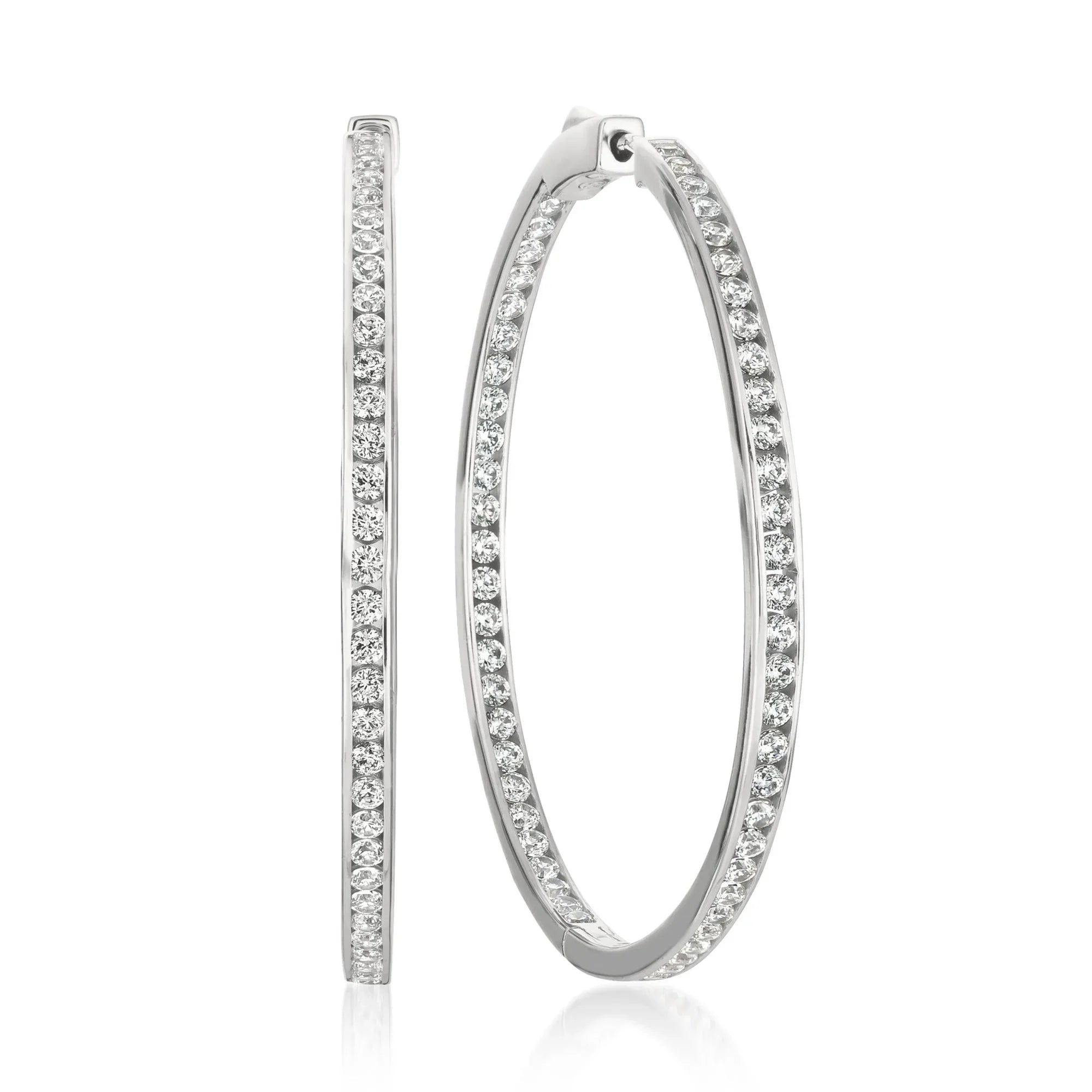 Pair of large silver-toned hoop earrings, each embellished with rows of clear, sparkling cubic zirconia stones on both inner