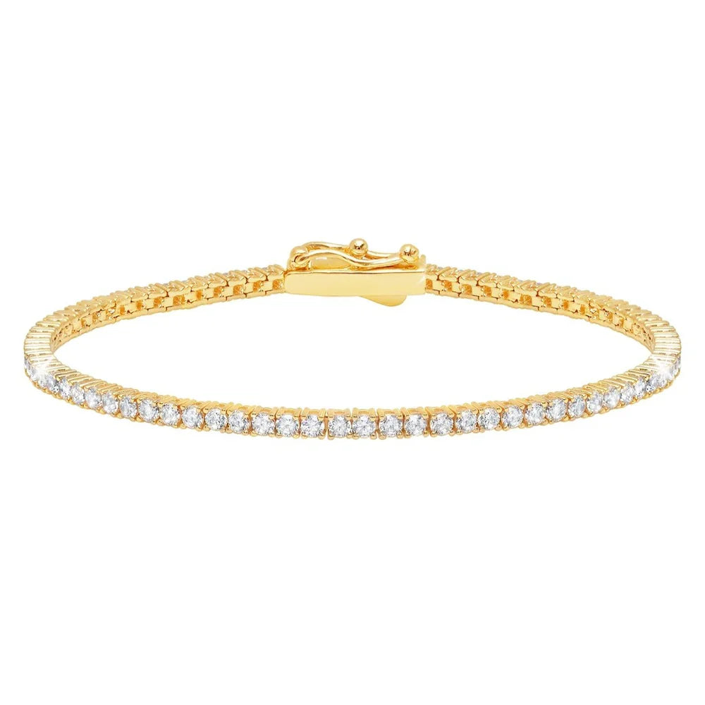 Gold-toned tennis bracelet featuring a continuous line of clear, round-cut cubic zirconia stones and a secure clasp.