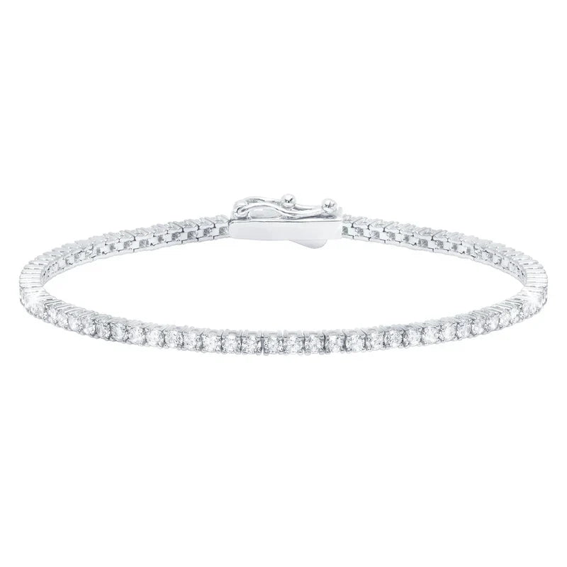 Silver-toned tennis bracelet with a continuous line of small, round, clear stones and a box clasp.