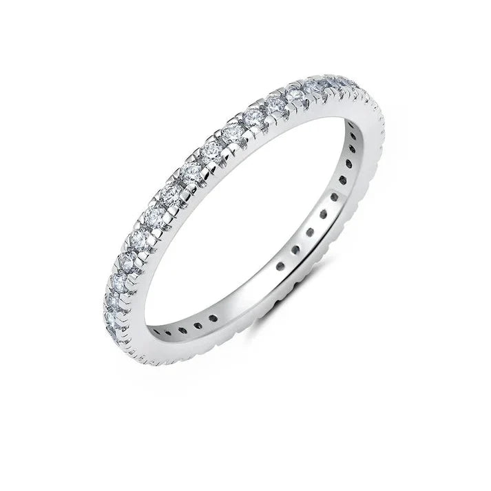Silver-toned eternity band with clear, round-cut cubic zirconia stones in prong settings.