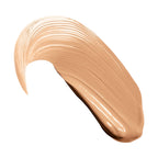 A curved swatch of light beige liquid concealer with a smooth, slightly glossy finish and visible brush strokes.