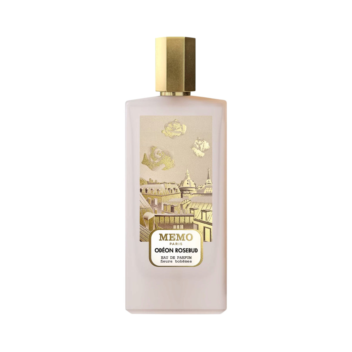 Frosted light pink rectangular perfume bottle with a gold-toned hexagonal cap and a gold-toned label depicting Parisian rooft