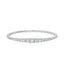 Silver-toned stretch cuff bracelet with a continuous line of clear, round, graduated cubic zirconia stones.
