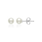 Pair of white spherical pearl stud earrings with silver-toned posts and butterfly backings.