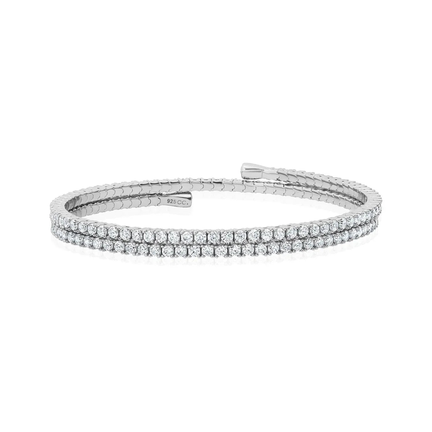Silver-toned dual-band open cuff bracelet with one band set with clear round stones and the other with a textured pattern.