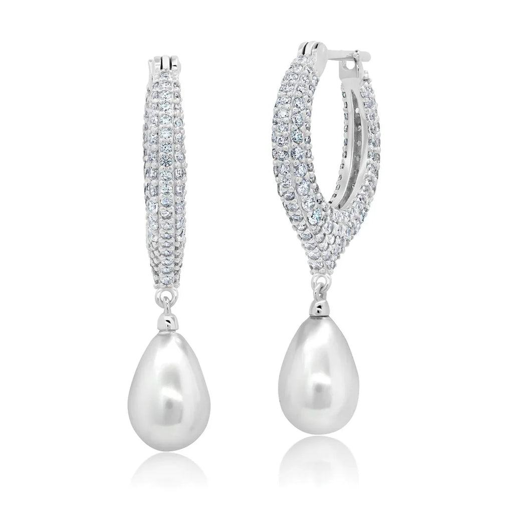 Silver-toned pavé-set oval hoop earrings with white teardrop pearl drops.