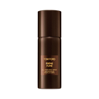 Dark brown cylindrical body spray can with a matching cap and a lighter brown label with white text.