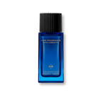 Blue rectangular hair fragrance bottle with a black ribbed cap, gold-toned text, and emblem.