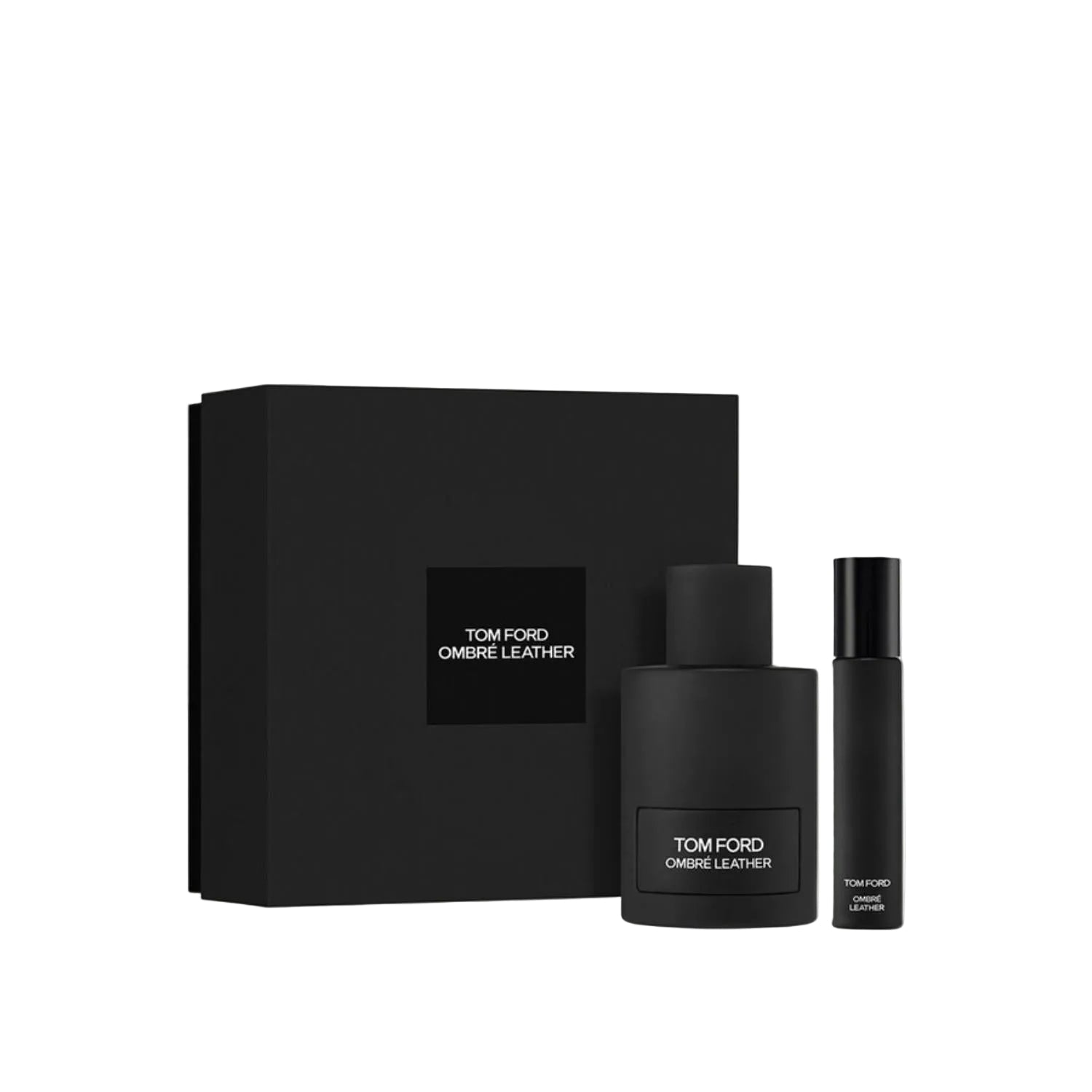 Tom Ford Ombré Leather gift set featuring a matte black presentation box with a centered black logo square, a sleek matte black perfume bottle with white branding, and a matching cylindrical black travel atomizer. Main image