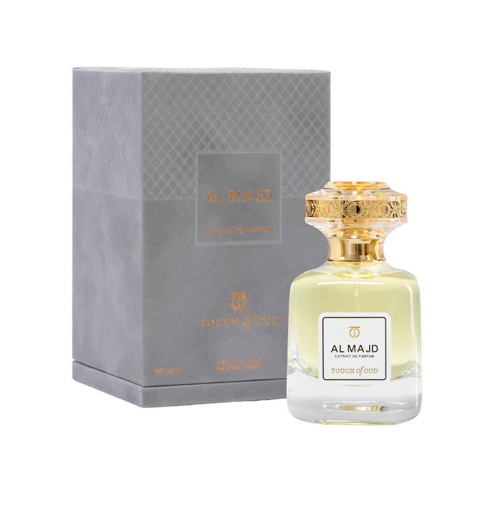 Touch of Oud Salwan 80ml perfume bottle standing next to its debossed grey presentation box, ready for purchase on the Paris Gallery Qatar store.
